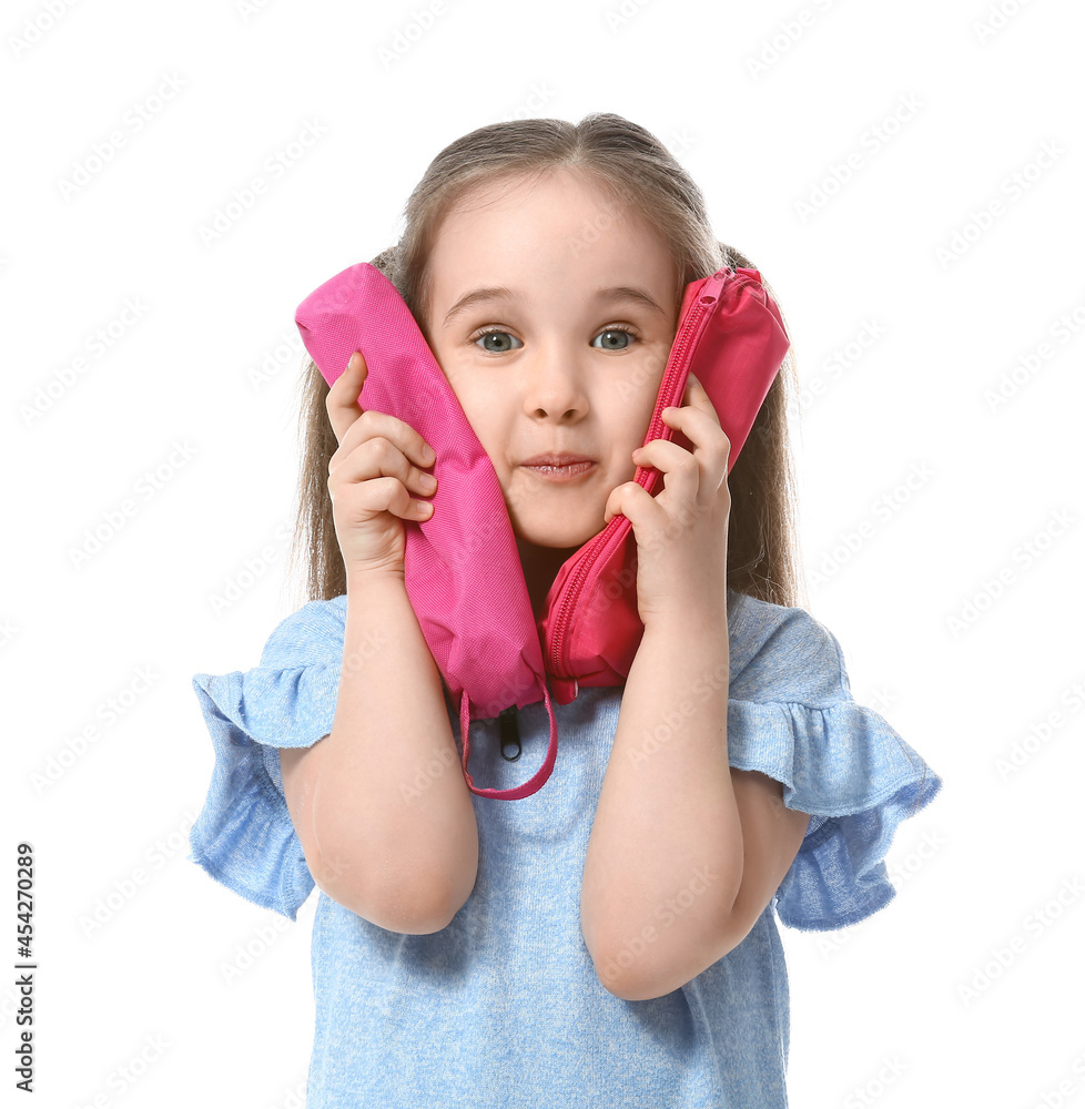 Little girl with pencil cases on white background