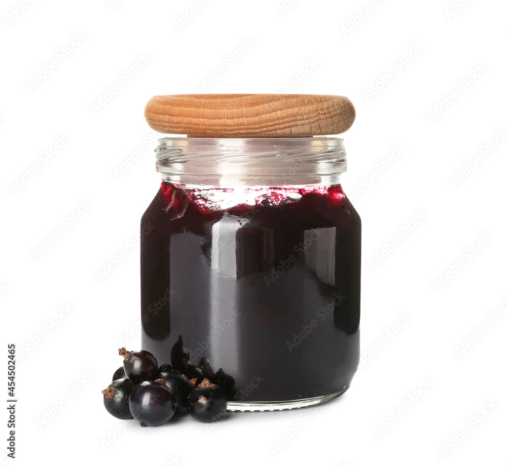 Jar with black currant jam on white background