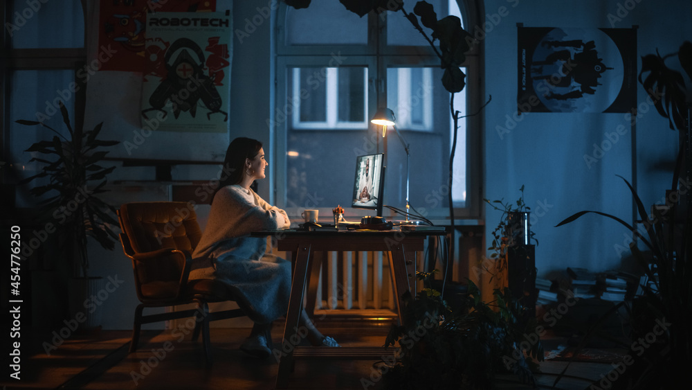 Young Beautiful Female Having a Conference Video Call Meeting on Desktop Computer in Creative Agency