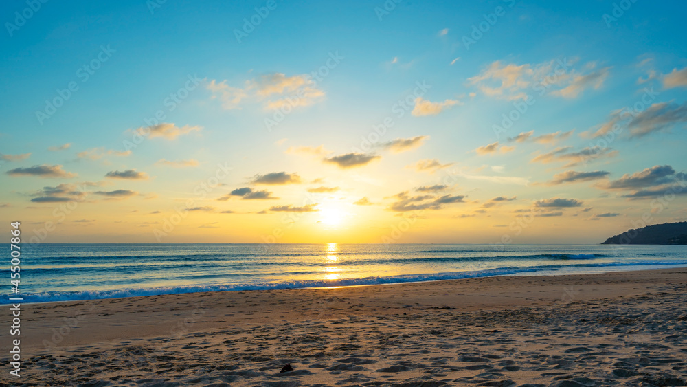 Sunset or sunrise sky clouds over sea sunlight in Phuket Thailand Amazing nature landscape seascape.