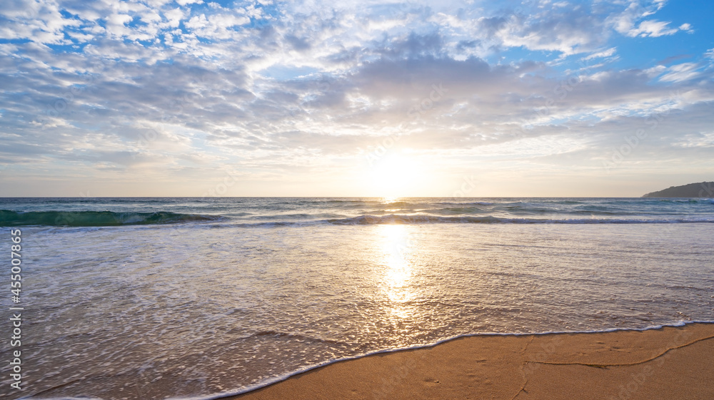 Amazing tropical beach sea Beautiful beach blue sea water Blue sky background sunset or sunrise sky 