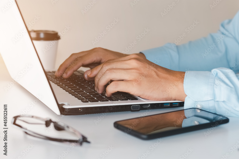 businessmen working at their desks with notebooks taking notes Accepting orders from online customer