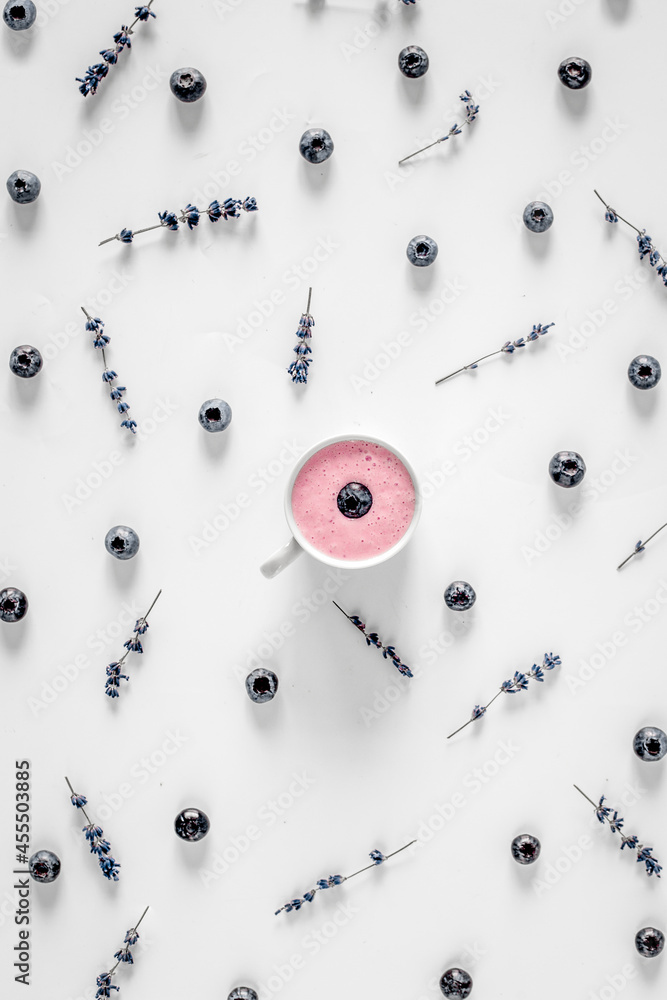 blueberry yoghurt with lavender flowers design on white background top view pattern