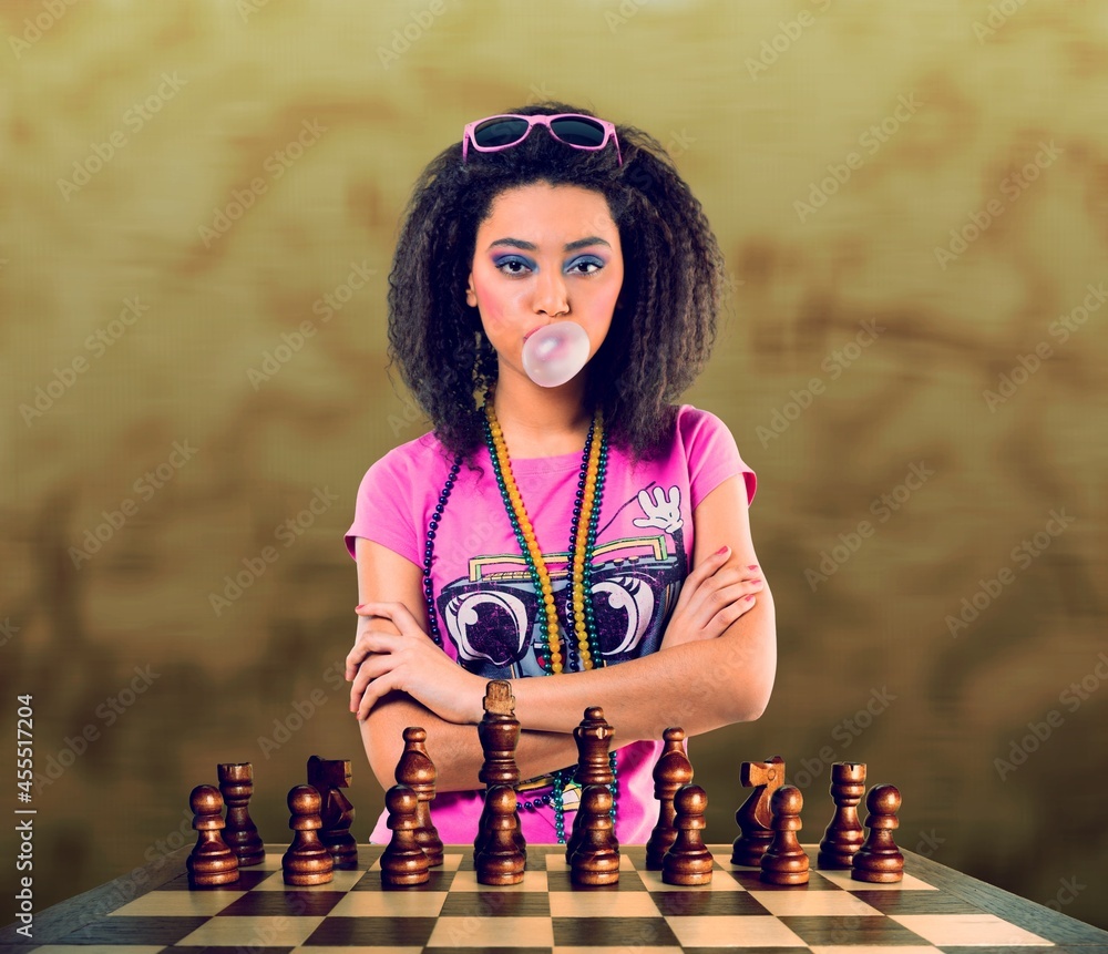 Ready for the game. Young woman model like legendary chess player