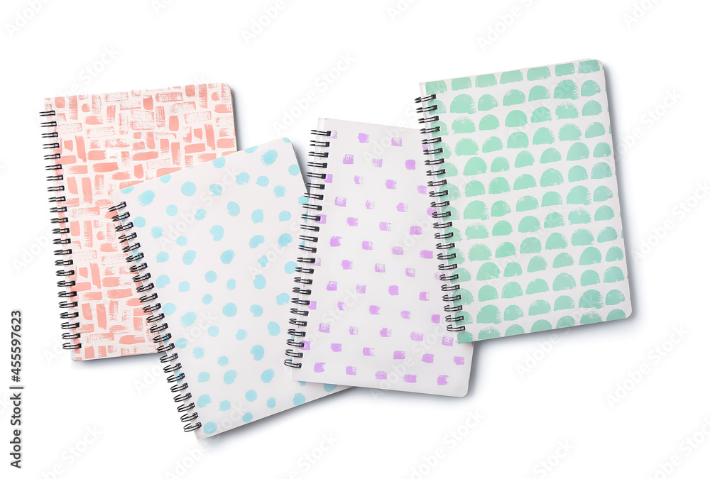 Stylish notebooks on white background