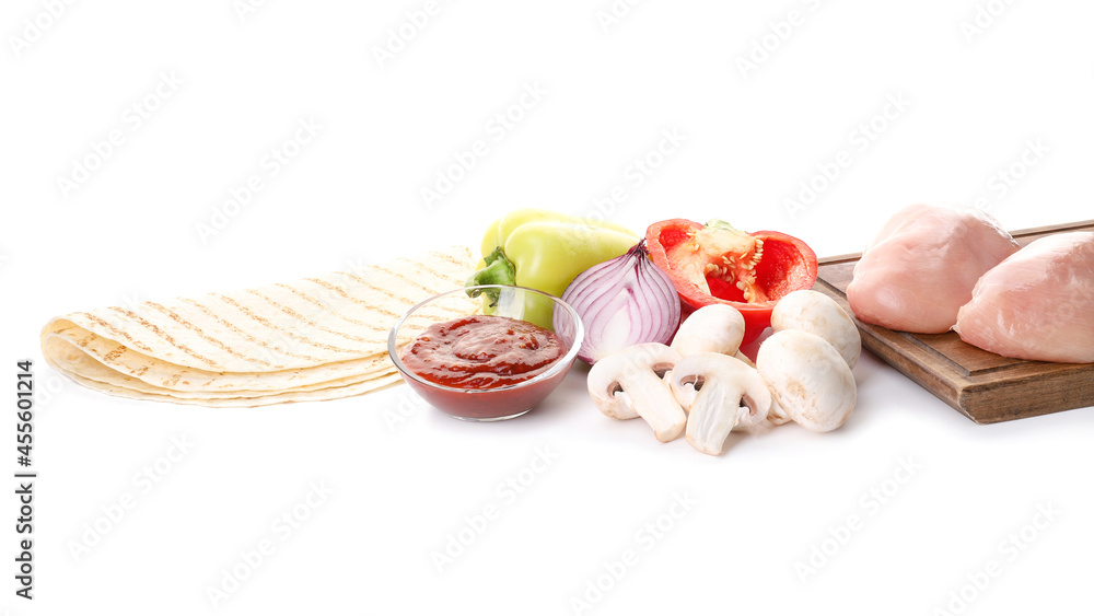 Fresh ingredients for tasty Fajitas on white background