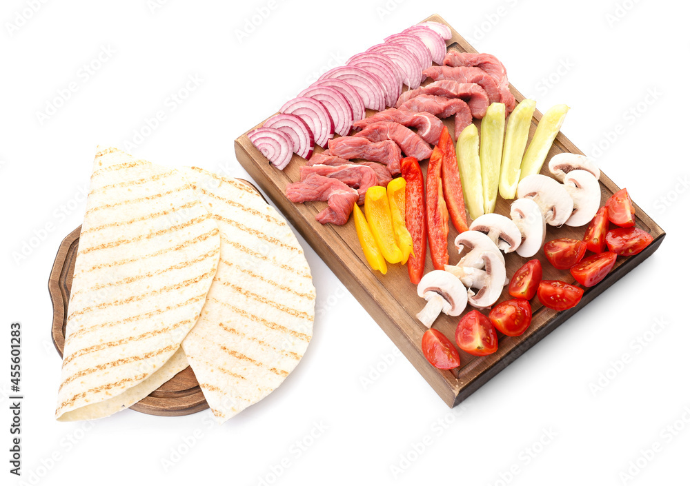 Fresh ingredients for tasty Fajitas on white background