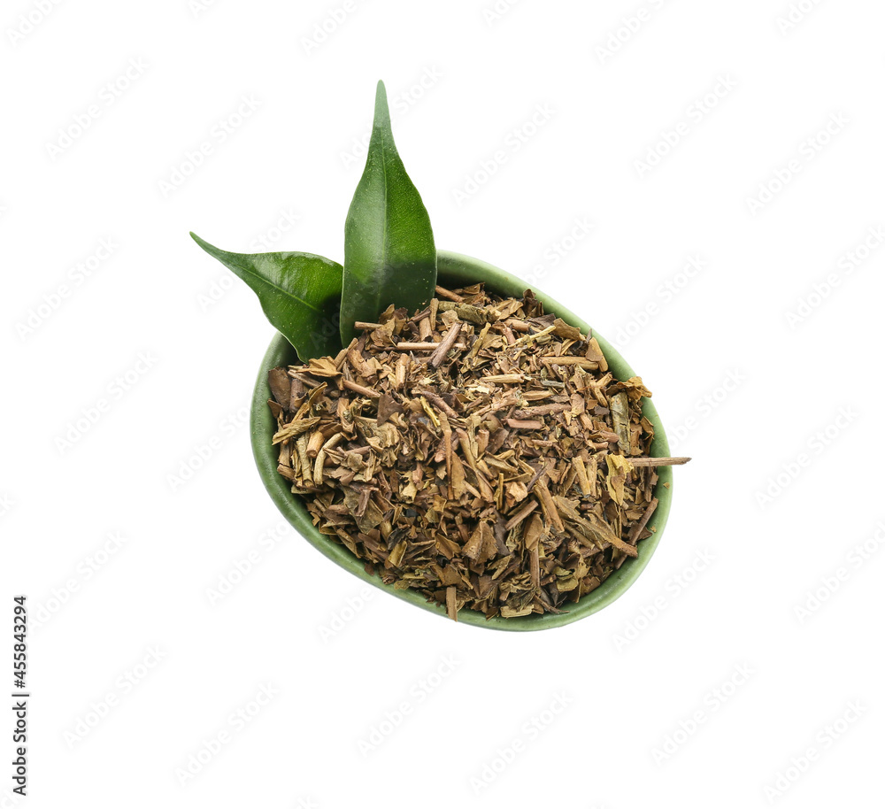 Bowl of dry hojicha green tea on white background