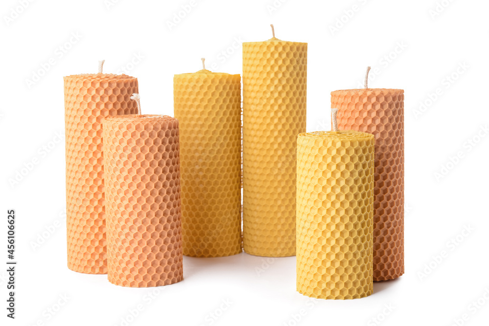 Wax candles on white background