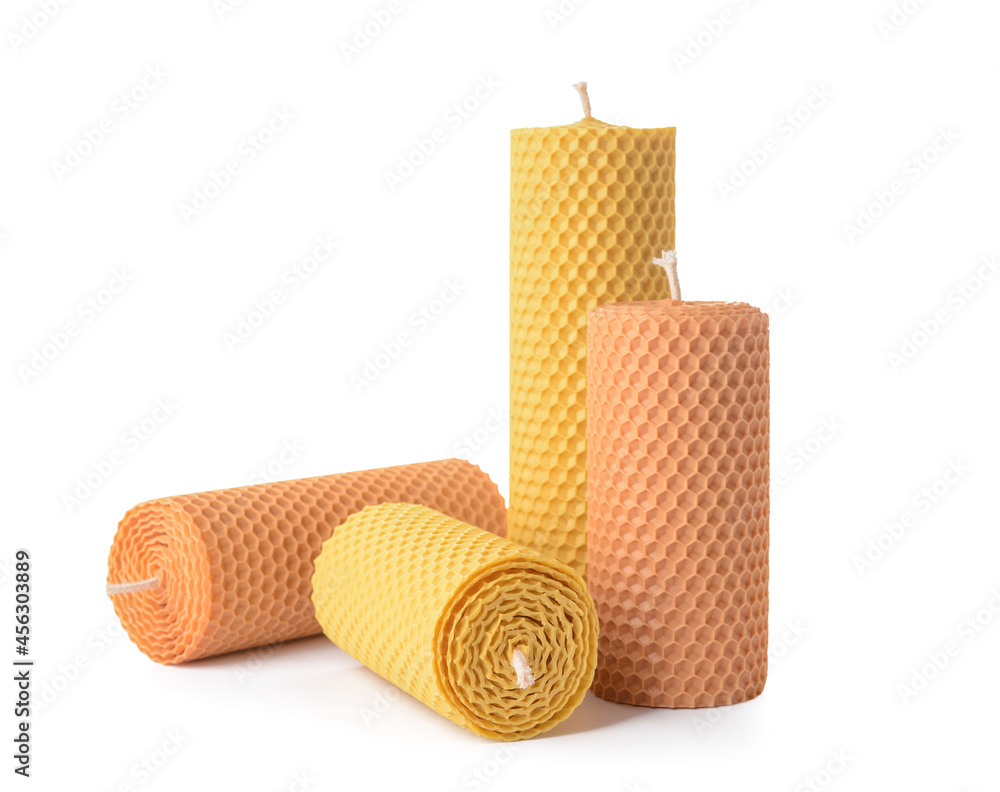 Wax candles on white background