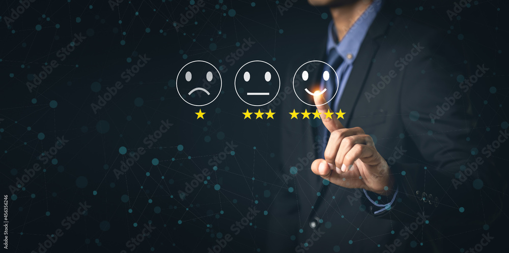 Customer Service and Satisfaction Concept Businessmen touch the virtual screen on happy smiley icons