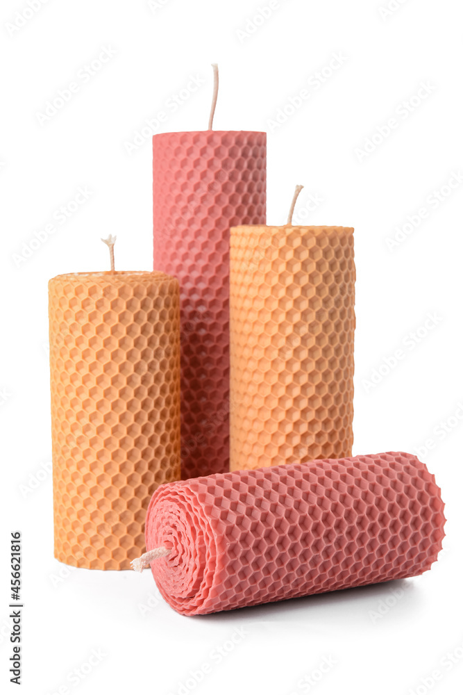 Wax candles on white background