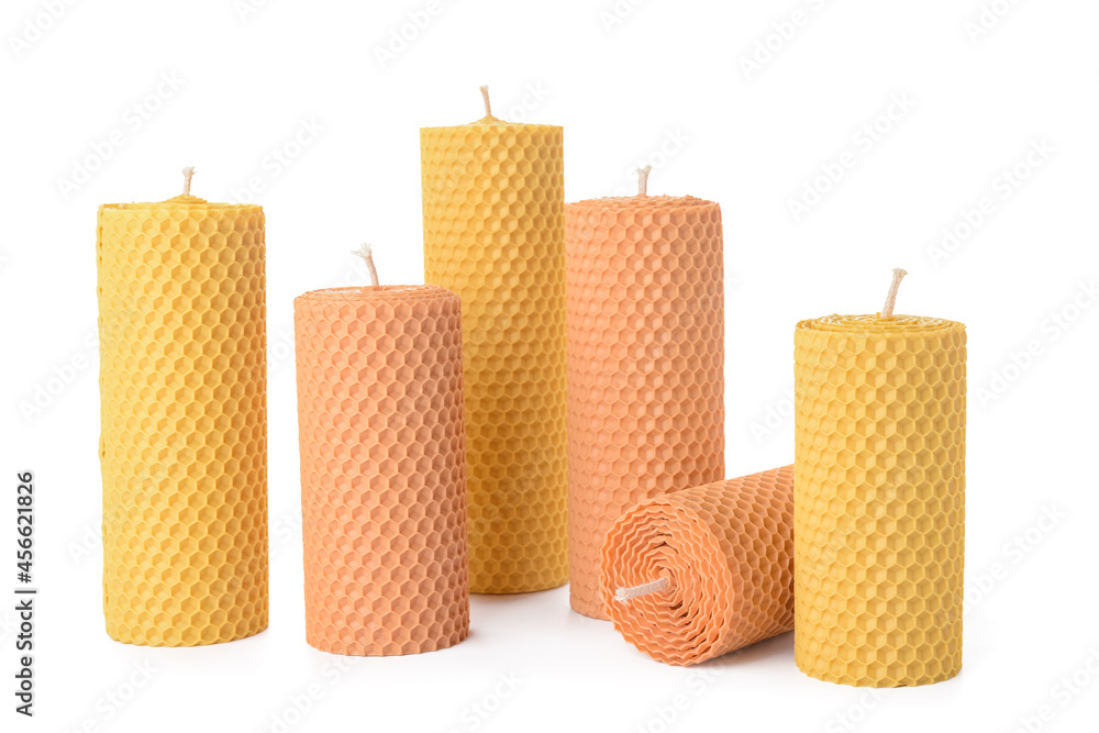 Wax candles on white background