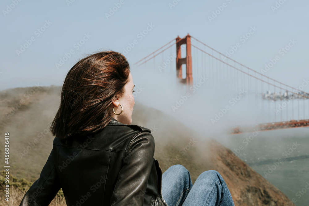 Woman enjoying the view of the Golden Gate Bridge in San Francisco