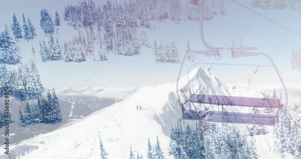 Image of winter scenery with ski chair lift and mountains