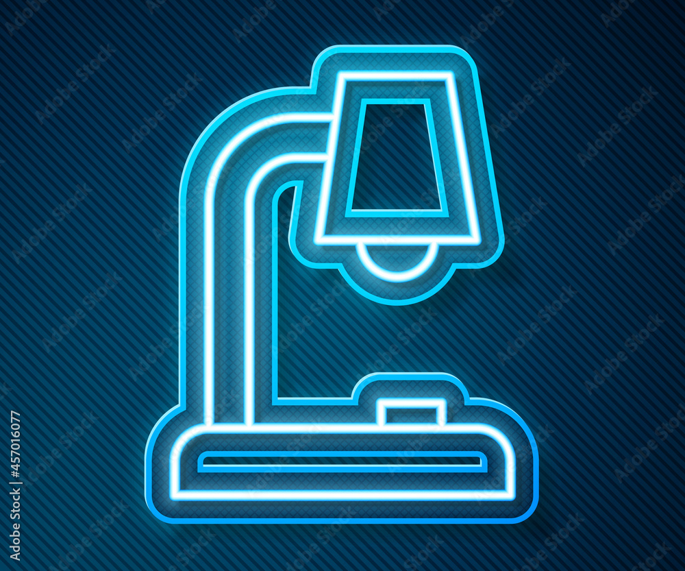 Glowing neon line Table lamp icon isolated on blue background. Vector