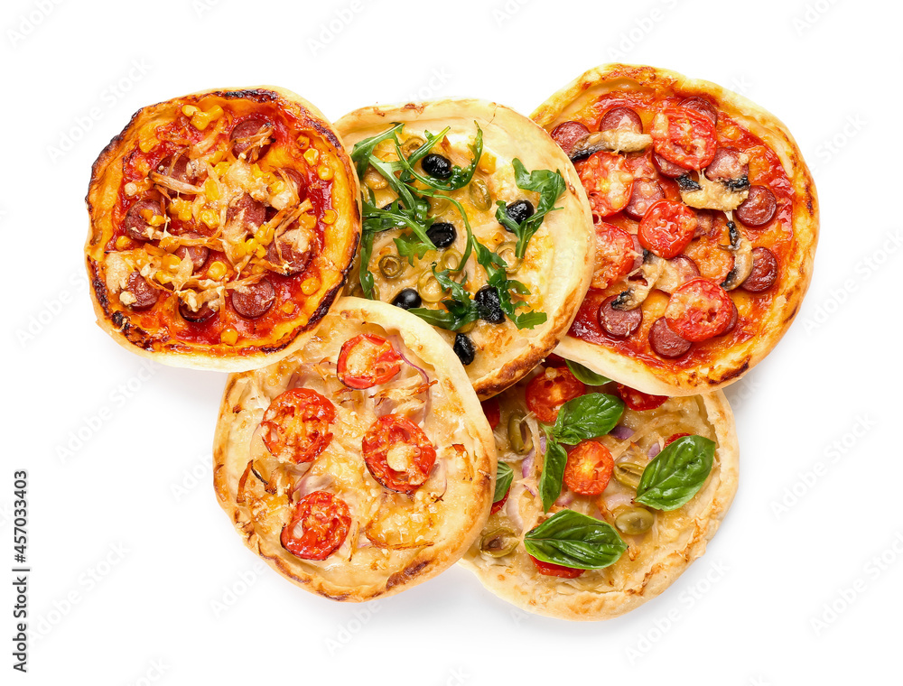 Tasty mini pizzas on white background