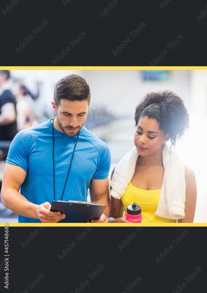 African american fit woman and caucasian female trainer at the gym against black background