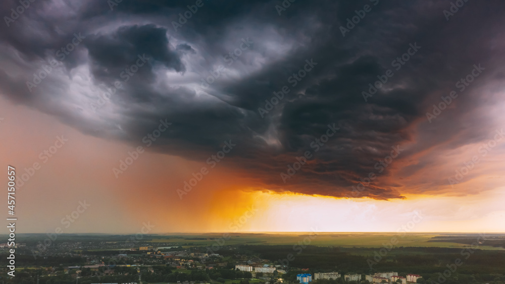 Stormy Sunset Sky Before Rain Above Skyline. Dramatic Cloudy Sky And Flash Light