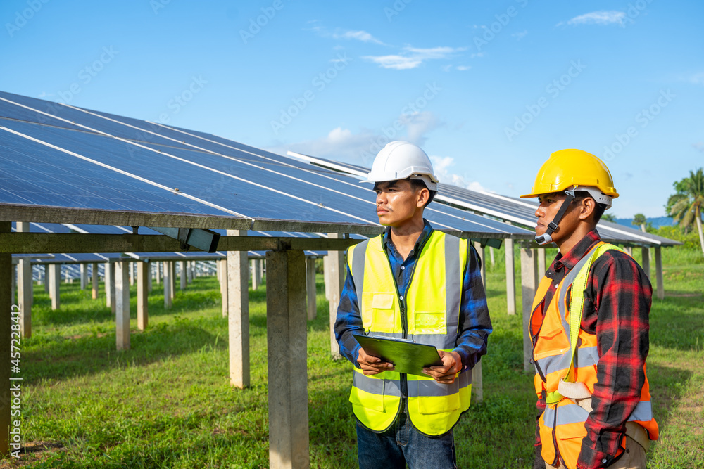 Engineers checking and maintenance equipment at industry solar power,Solar Energy,Clean Energy,effic