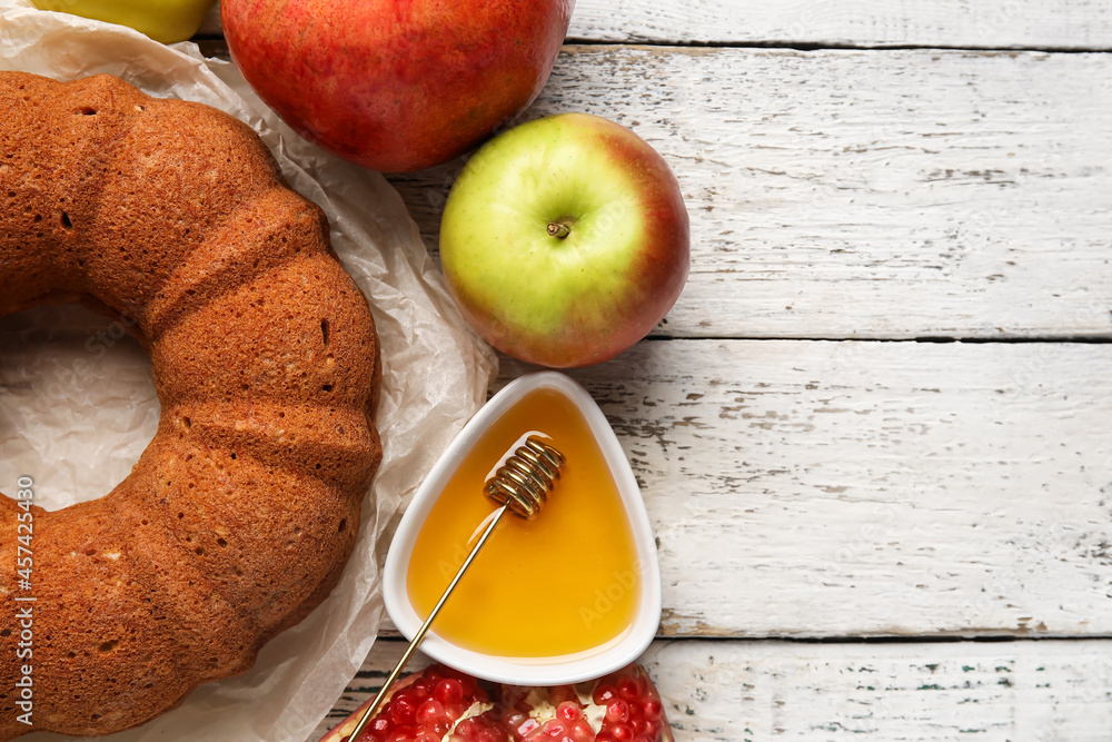 白色木底蜂蜜和水果面包。Rosh hashanah（犹太新年）庆祝活动