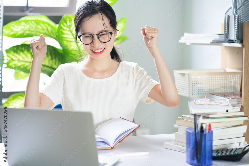 Asian young girl doing homework