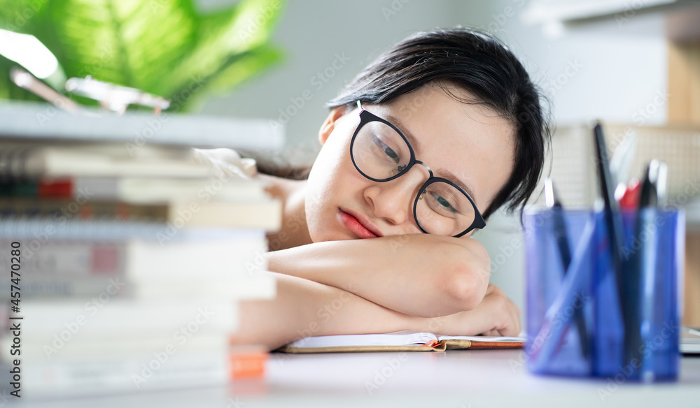 Asian young girl doing homework