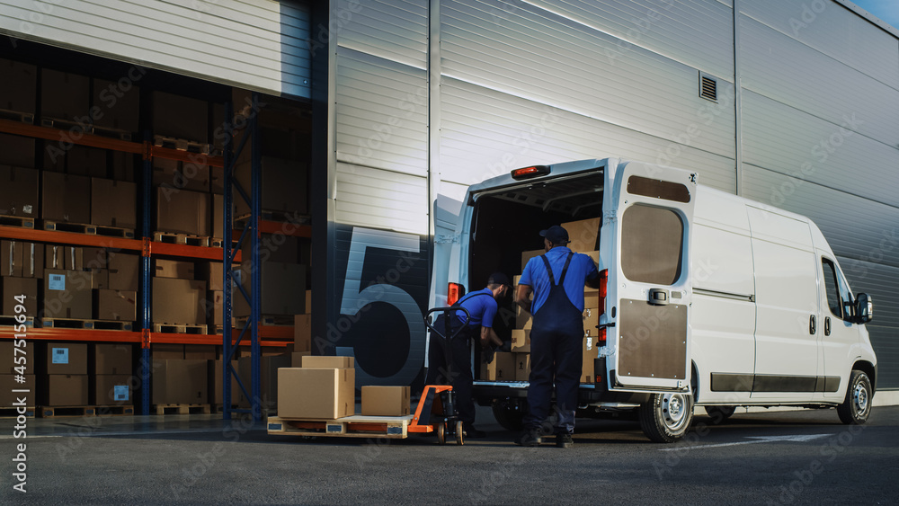 Outside of Logistics Distributions Warehouse With Manager Using Tablet Computer, Workers Start Loadi