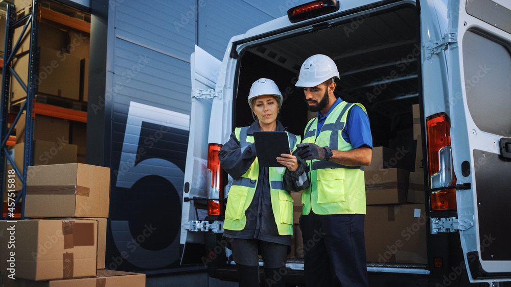 Outside of Logistics Distributions Warehouse With Inventory Manager Using Tablet Computer, talking t