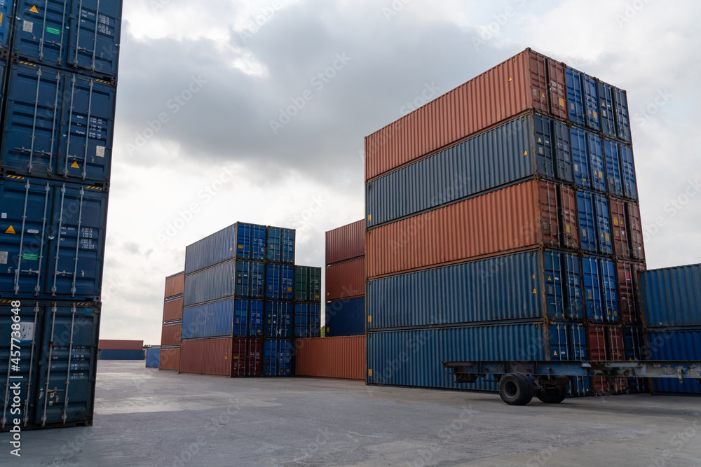 Cargo container for overseas shipping in shipyard with heavy machine . Logistics supply chain manage