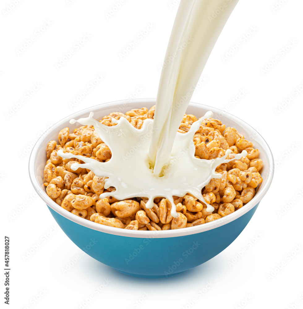 Puffed wheat with milk splash isolated on white background