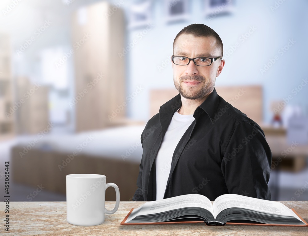 Young happy teacher talking on video conference call