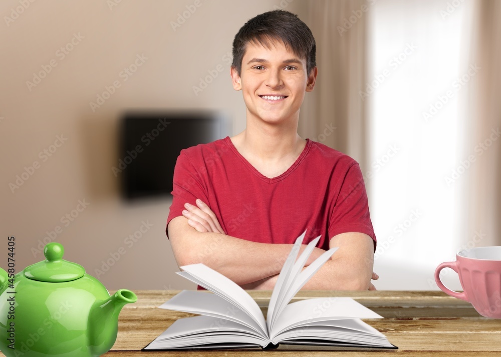 Young happy teacher talking on video conference call