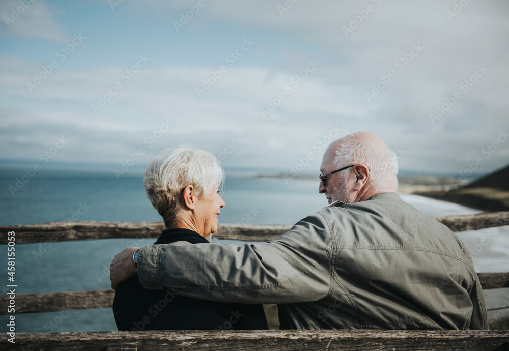 Senior couple enjoying the view of the ocean