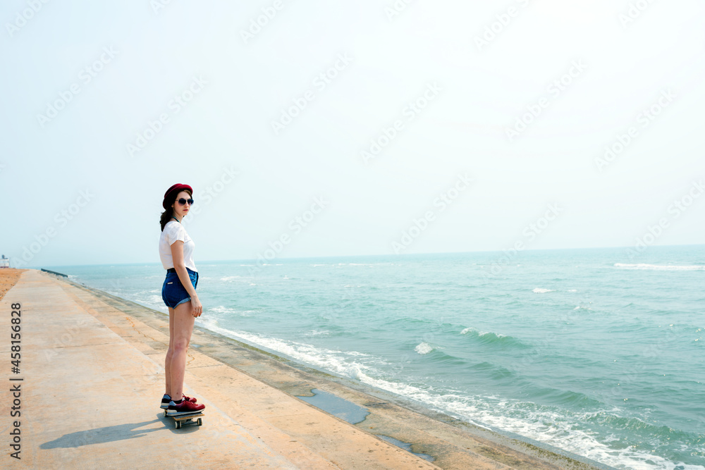 A caucasian woman is enjoying the summer time