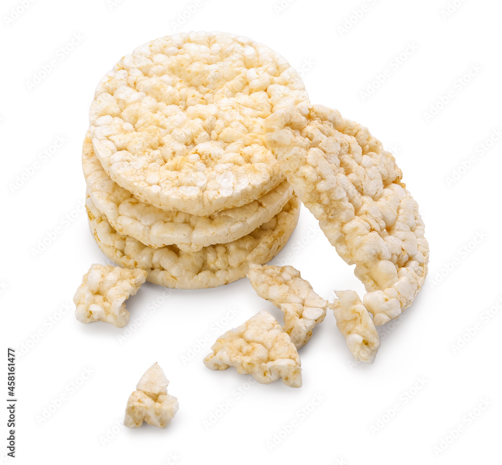 Pieces of crunchy corn crackers on white background