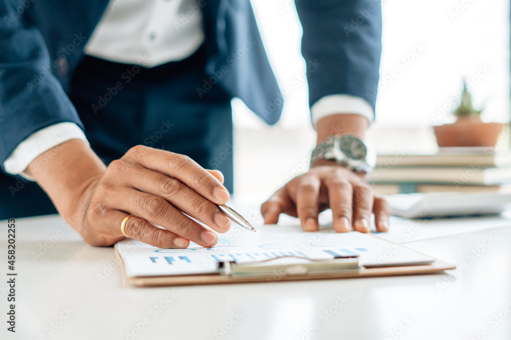 Auditor or internal revenue service staff, Business man checking annual financial statements of comp