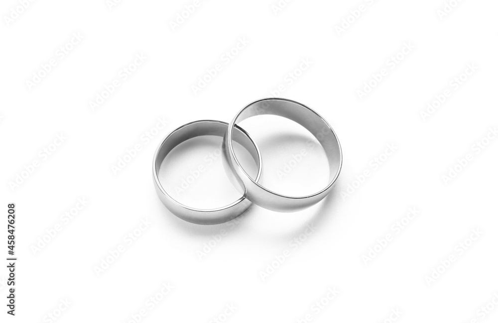 Pair of wedding rings on white background