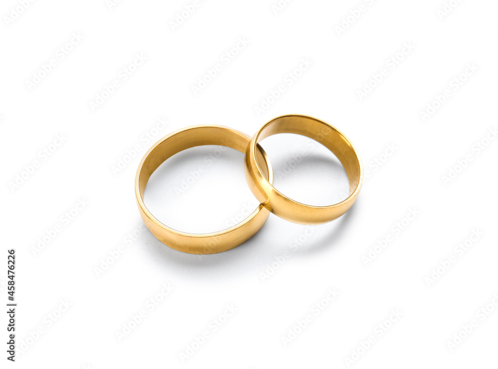 Pair of wedding rings on white background