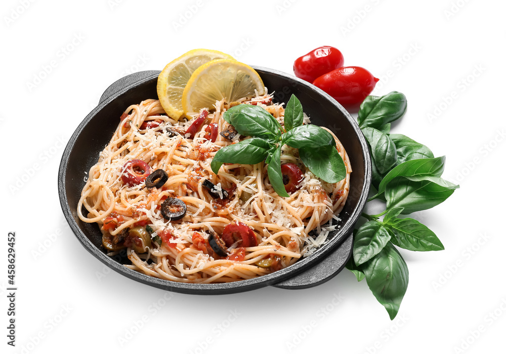 Frying pan of tasty Pasta Puttanesca on white background