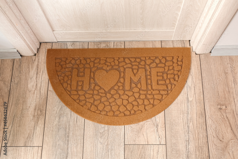 Door mat on floor in hall