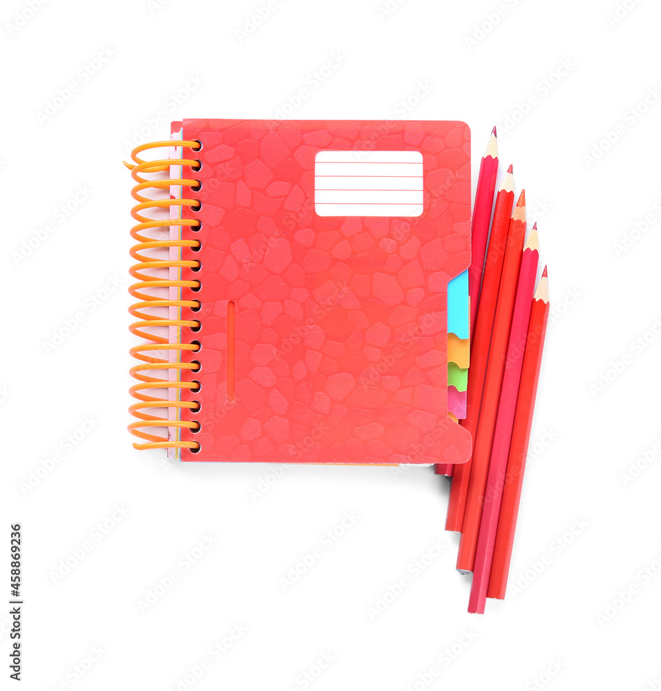 Notebook and different pencils on white background