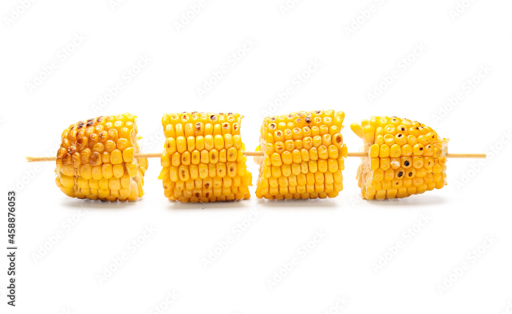 Pieces of delicious grilled Mexican street corn on white background