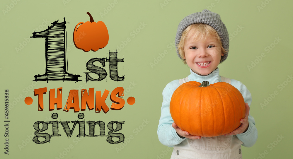 Cute boy with pumpkin on color background. First Thanksgiving Day celebration