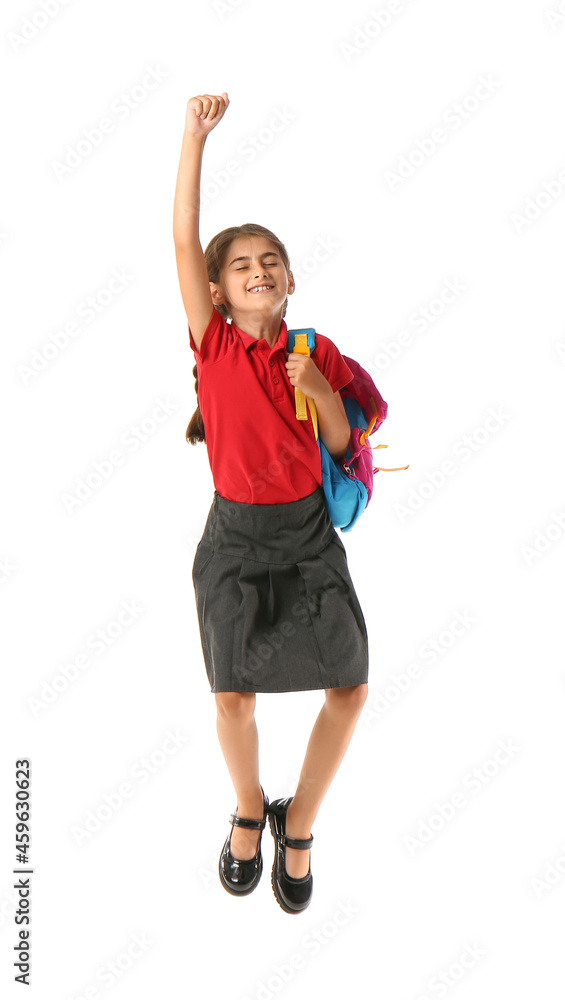 Jumping schoolgirl on white background