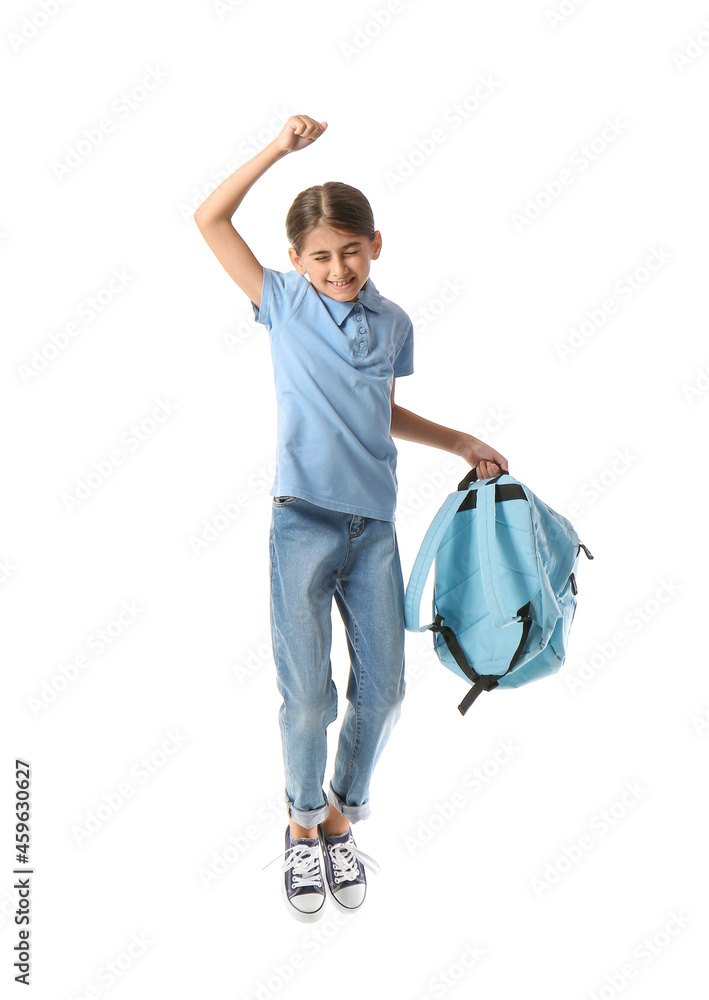 Jumping schoolgirl with backpack on white background