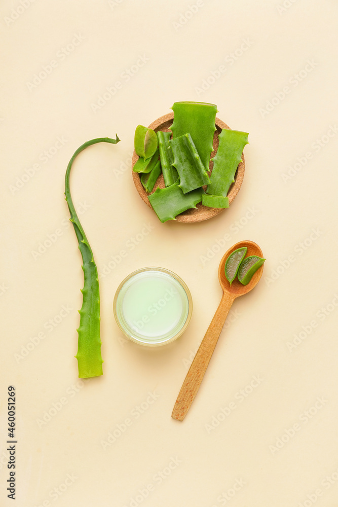 Cosmetic cream with aloe on light background