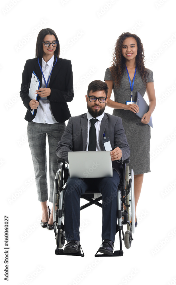 Man in wheelchair with his colleagues on white background