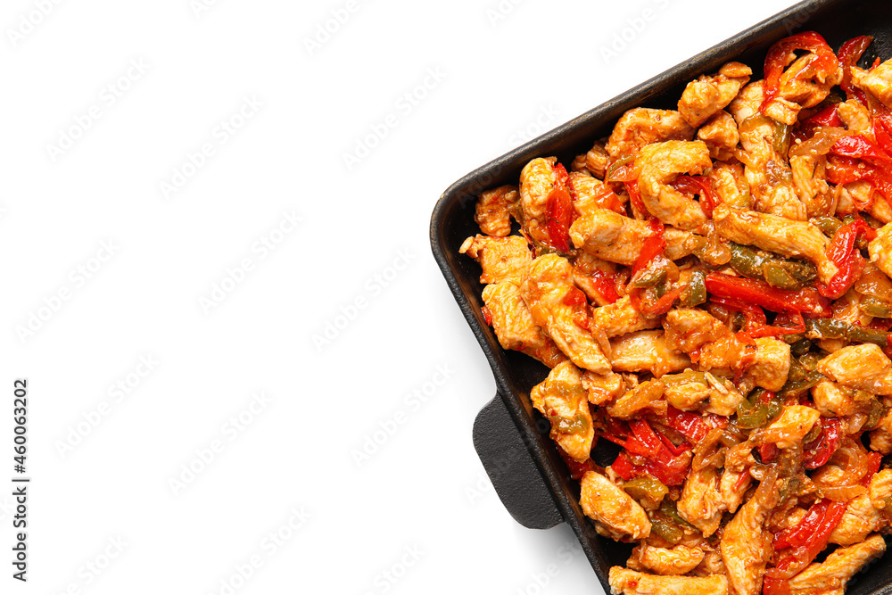 Delicious chicken Fajita in frying pan on white background