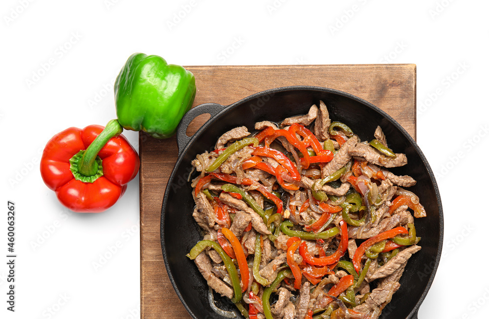 Delicious beef Fajita in frying pan on white background